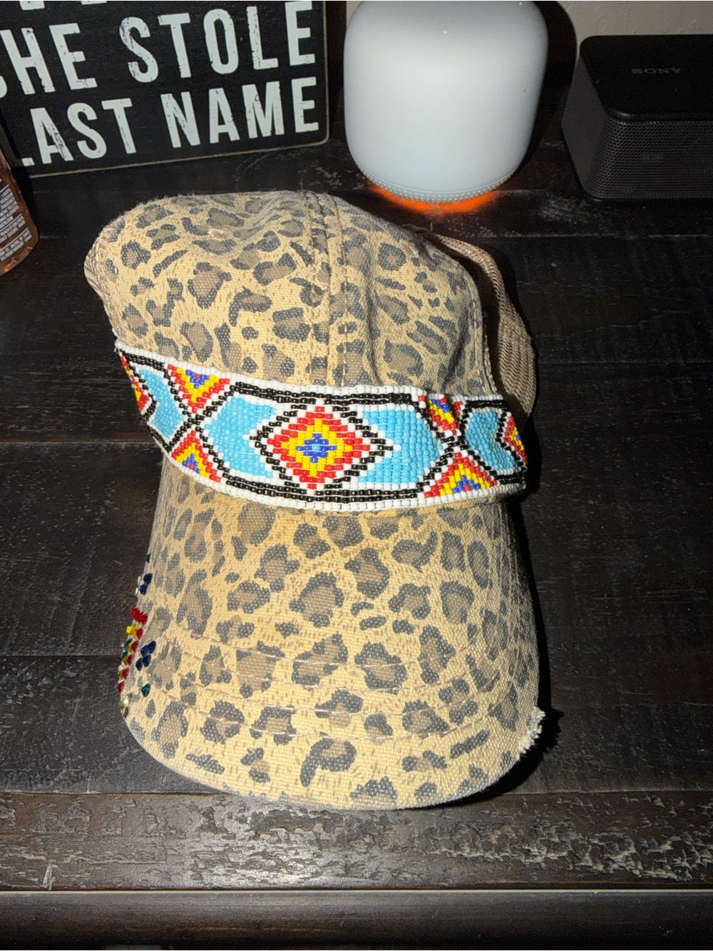 Women’s leopard hat with custom bead band and rhinestones